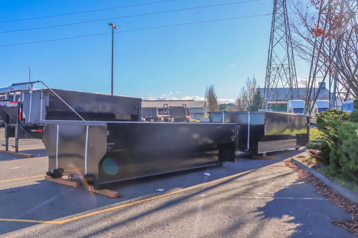 Roll-off dumpster ready for waste disposal at job site for 2 Yard Dumpster Rental in Jackson